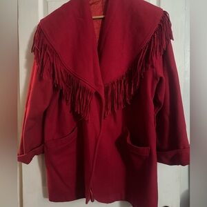 This red vintage wool jacket with with tassels size extra large